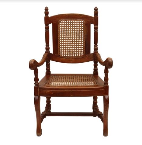 A narra chair with leaf motifs on handles