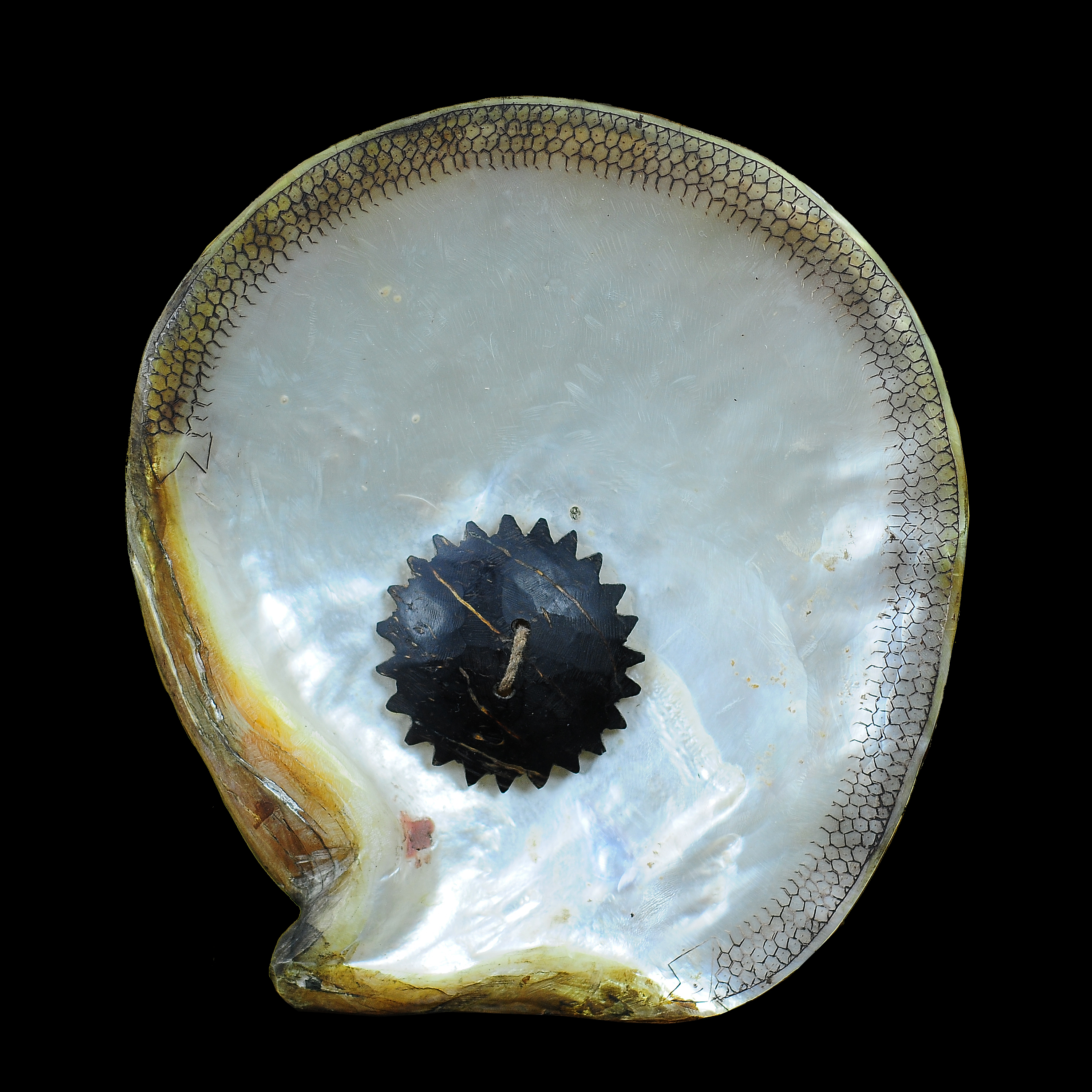 - A Fikum or hip ornament