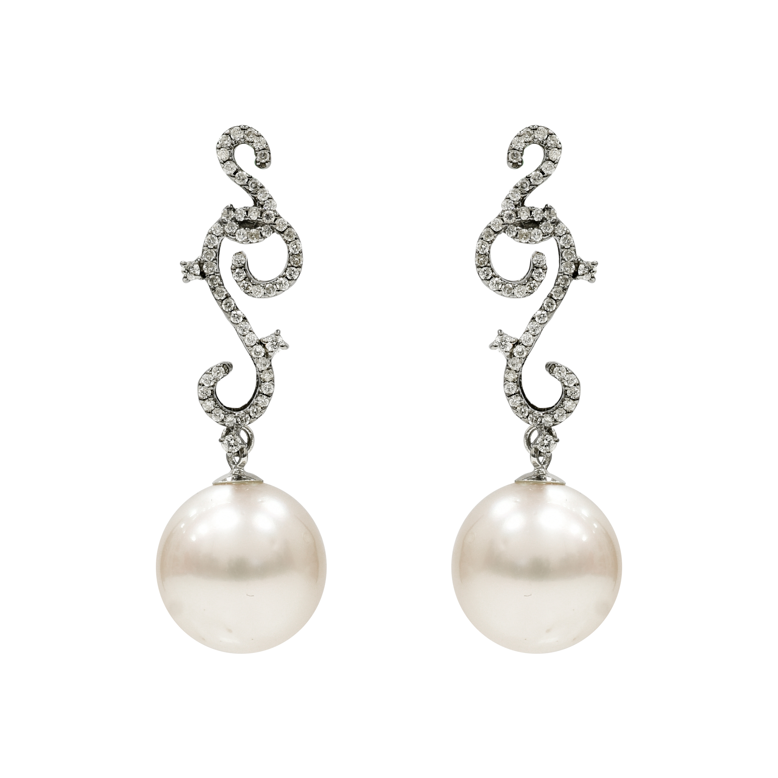 - A pair of approximately 1.14 tcw diamond and 10 mm pearl earrings set ...