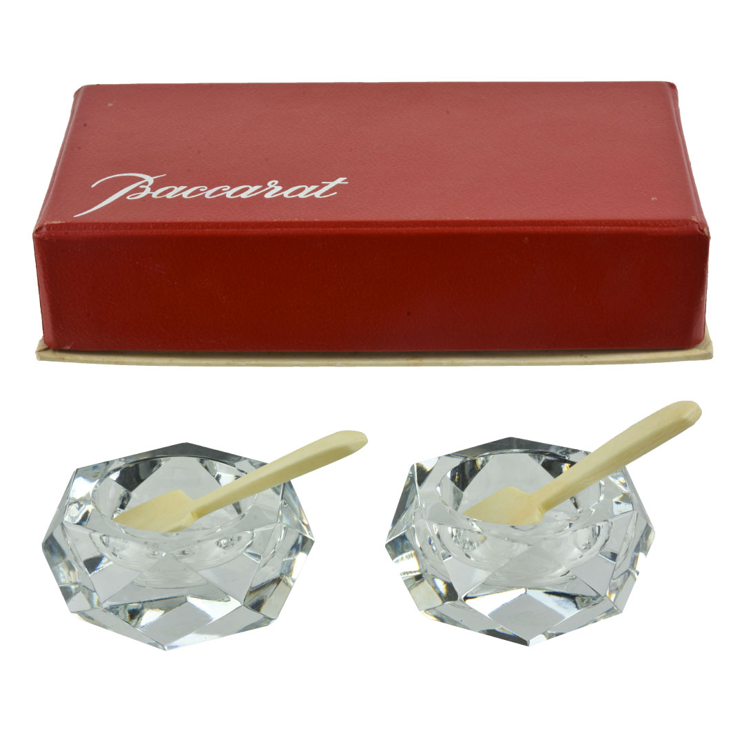 Baccarat A pair of salt and pepper dishes with ivory spoons