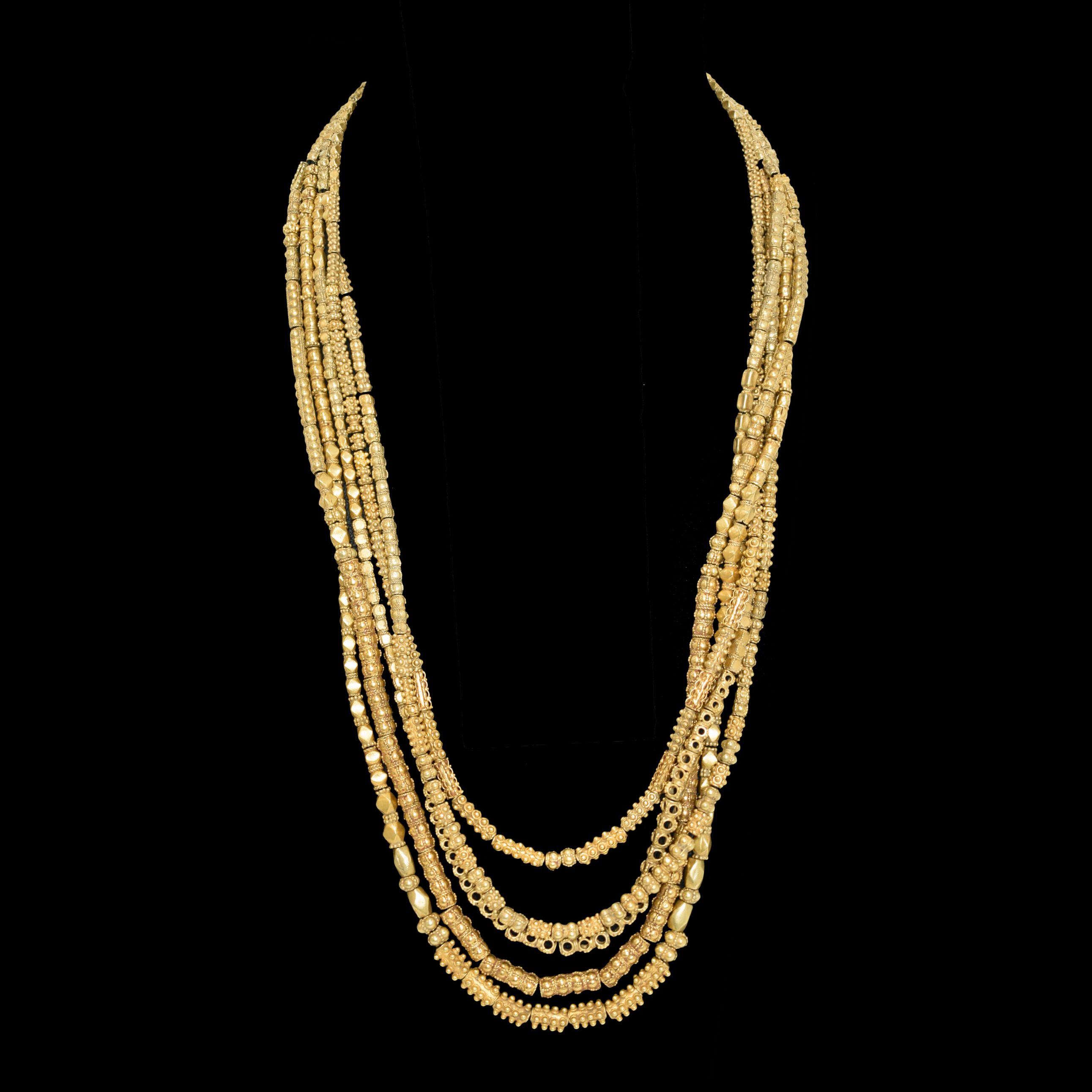 - A five-layered excavated gold necklace