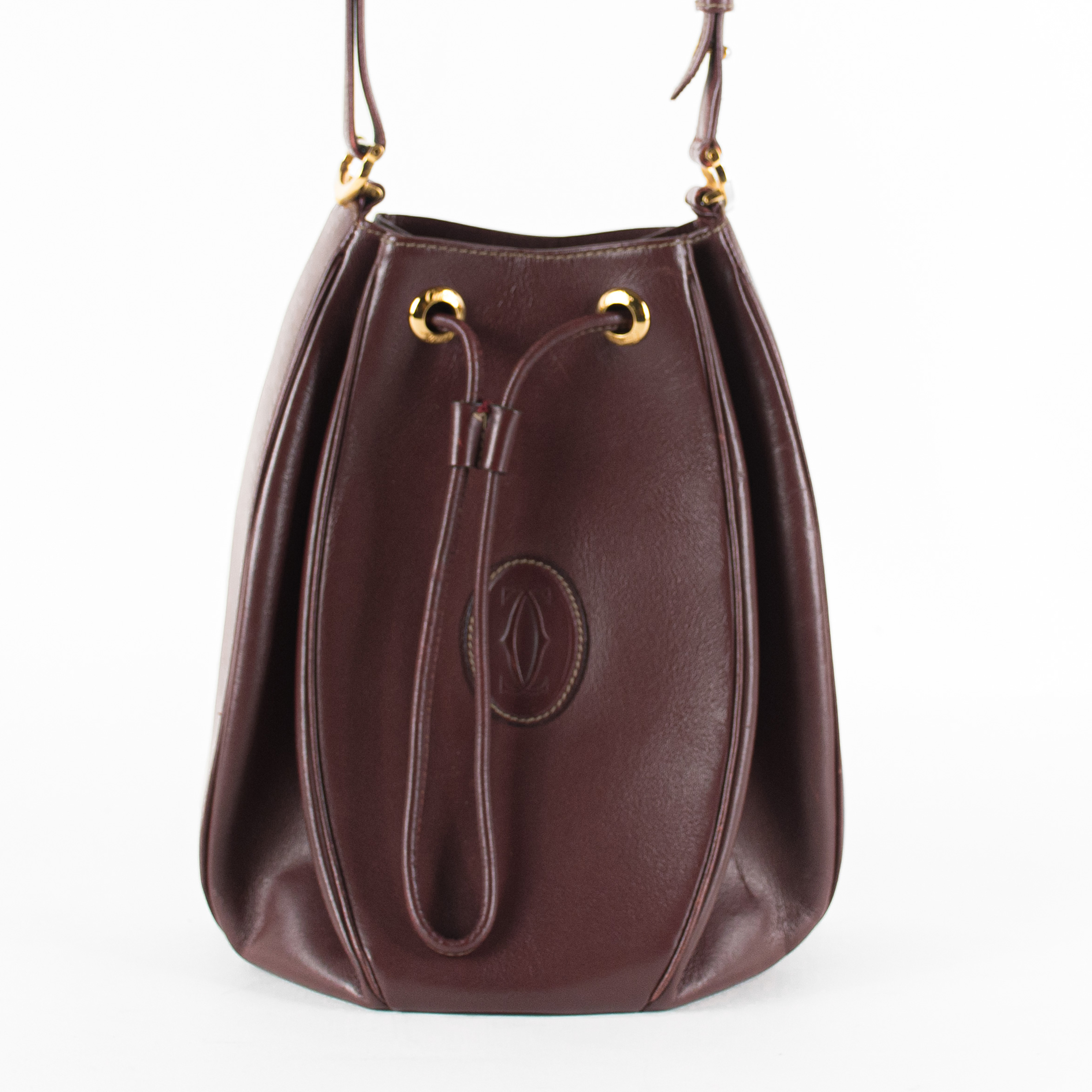 Cartier - A maroon handbag