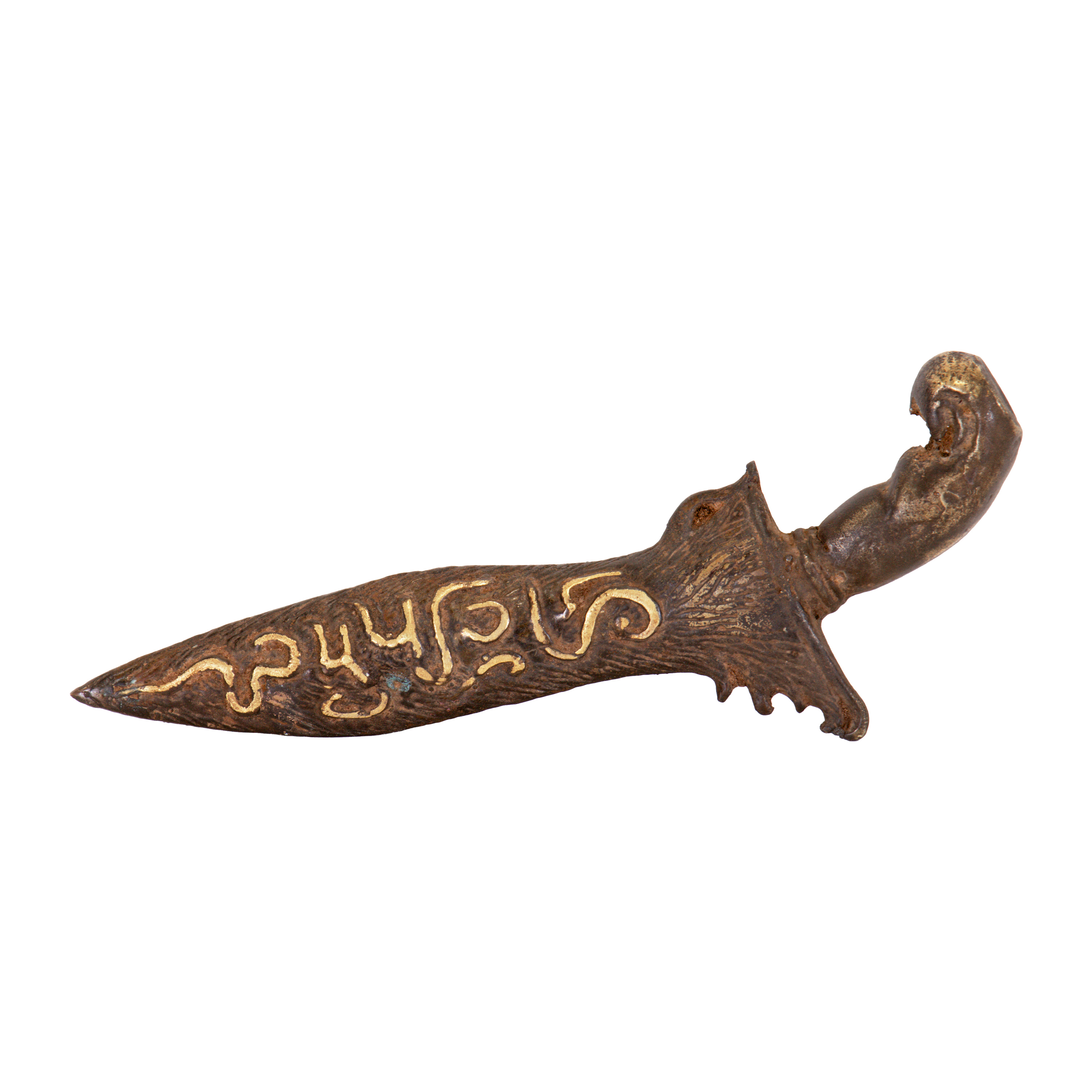 - A brass ethnographic dagger with gold lettering